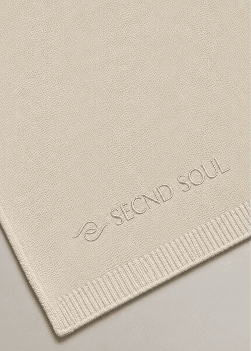 Folded cashmere blanket with Secnd Soul mark