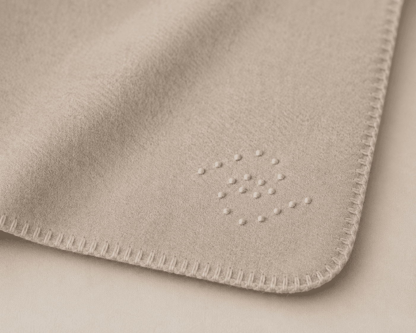 Cashmere blanket with twenty embroidered marks
